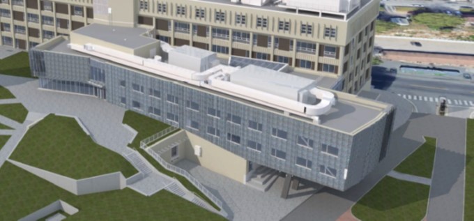 Rendering of three story building with windows and roof equipment and some grass and walkways around it. 
